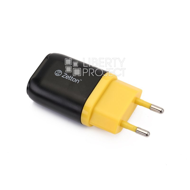 Сетевое зарядное устройство (СЗУ) с выходом USB ток зарядки 1А черное с желтой вставкой Zetton ZTLSTC1A1UBY